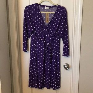 Purple and white polka dot dress.